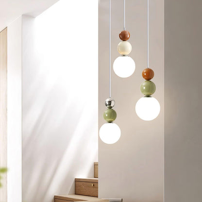 Minimalist Pendant Lamp with Glass Globe and Stacked Spheres