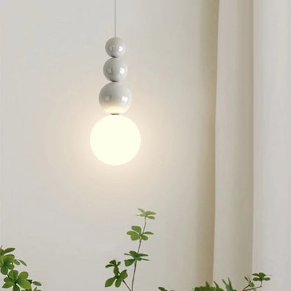 Modern LED Pendant Lamp with Stacked Glass Spheres and Metal Frame