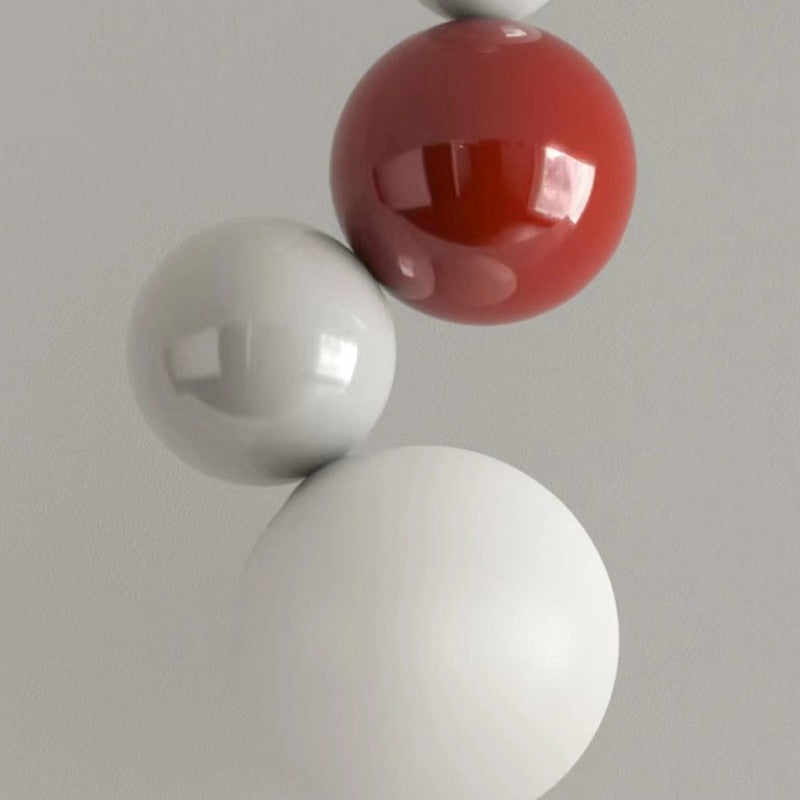 Modern LED Pendant Lamp with Stacked Glass Spheres and Metal Frame