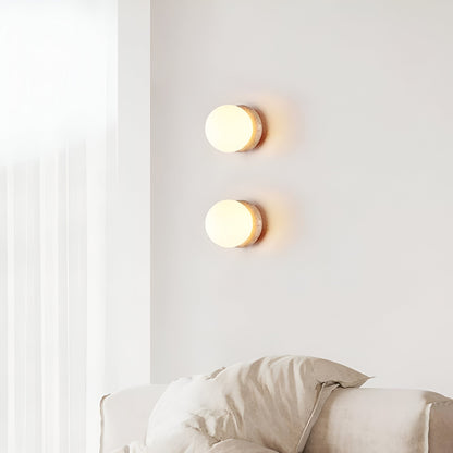 Modern Round Wall Lamp with Travertine Stone Base and Frosted Glass Shade