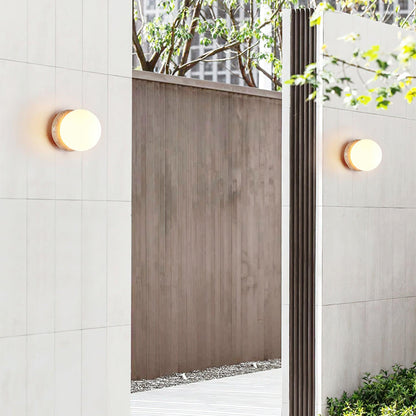 Modern Round Wall Lamp with Travertine Stone Base and Frosted Glass Shade
