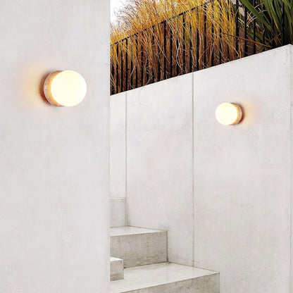 Modern Round Wall Lamp with Travertine Stone Base and Frosted Glass Shade